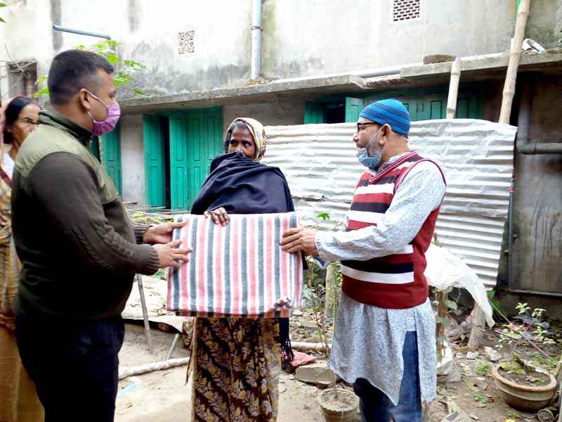 Distributing Blanket among the Cold Affected People
